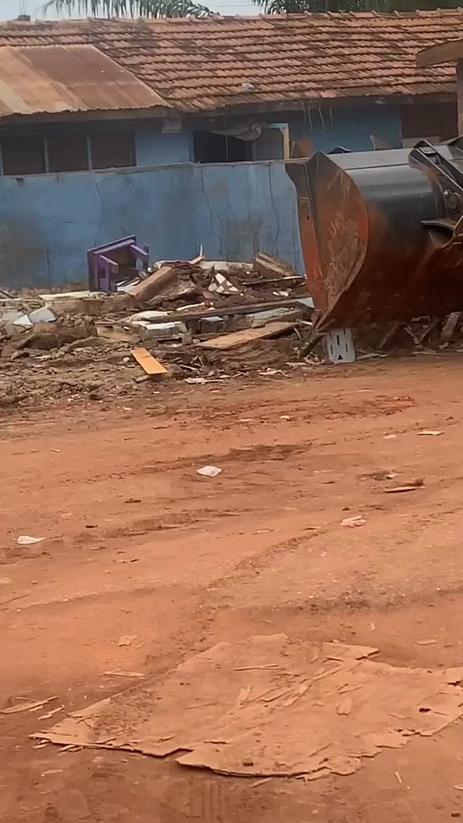 Demolition Scare: Elderly Woman Nearly Crushed at Adenta Station Market Site